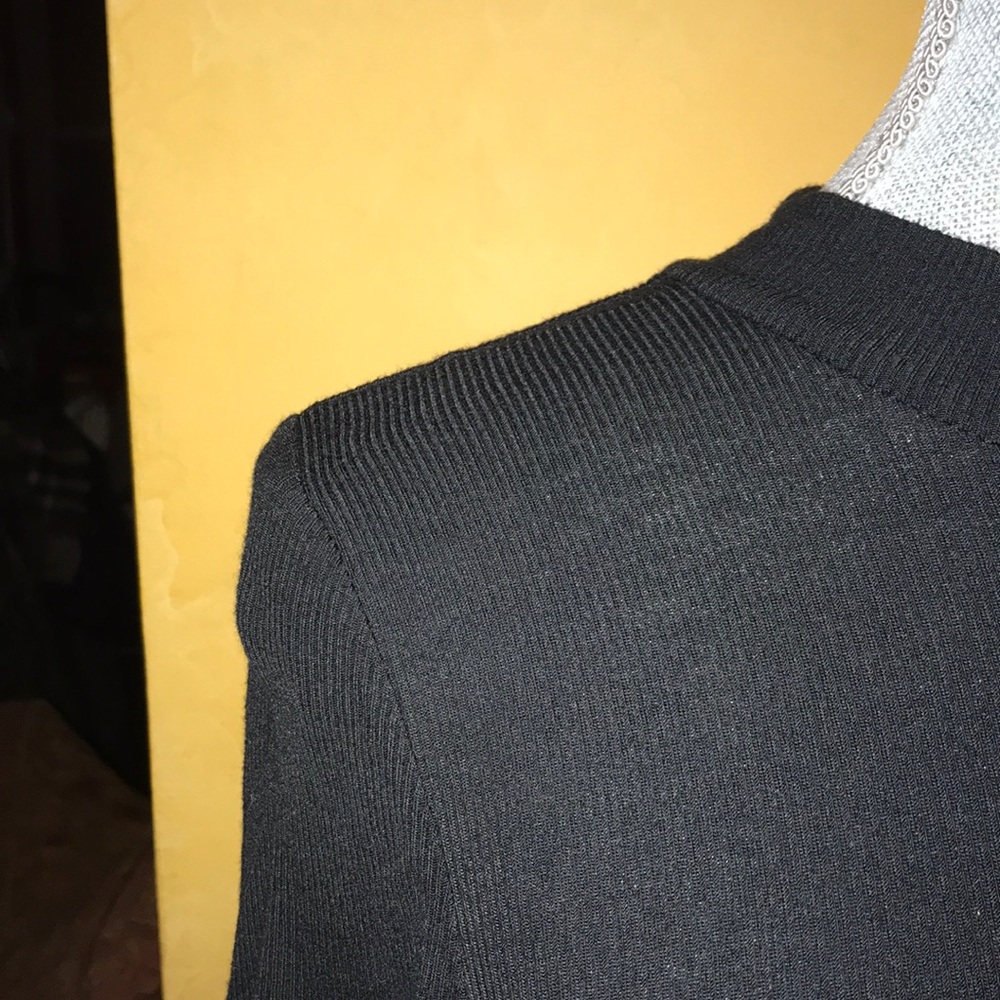 A ribbed black skater dress